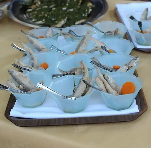 לינה וארוחת בוקר Il Grifo 3*